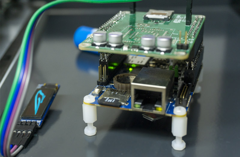 Close-up view of KSTR-SPARX Single Board Computer with a mounted battery